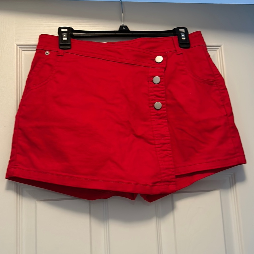 Bright red shorts that look like a skirt in the front.  Size 9, never worn